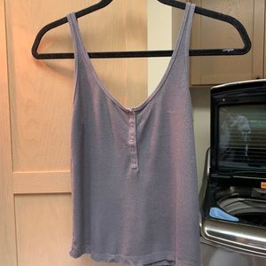 Dark grey tank with 5 buttons.